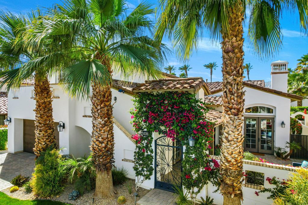 You will be hard pressed to find a home of this incredible qualIty with a wow factor times 10! Classic Spanish architecture chicly designed with modern Mediterranian flair with soaring ceilings, tons of light, an expansive great room, gourmet kitchen, 6 baths and 4 ensuite bedrooms each opening onto their own private patio including a massive 2 room 675' guest suite with incredible mountain views! This is the perfect house for entertaining guests and family! Glass pocket doors lead to the lanai with a salt water pool and Barbeque island with captivating, lush landscaping throughout the property. Newer construction, built in 2016 and meticulously maintained with a luxurious primary suite with french doors opening to the pool. All 4 bedrooms are generously proportioned, privately set with large closets, custom shades, smart TVs and French doors to the outside. Located tucked away at the end of a private cul de sac, close to the clubhouse, the Citrus Club is a premier community affiliated with historic La Quinta Resort & CLub. The Citrus neighborhood offers breathtaking grounds for walking and biking, abundant citrus treees, low HOA dues, 24 hour security and is close to world class golf, tennis, dining, spas and shopping. This is a must see home!Lwase must be minimum one year.