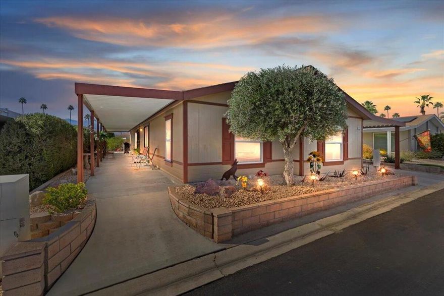 Welcome to Suncrest Country Club -- an active 55+ golf community in the heart of Palm Desert!This beautifully maintained 3-bedroom, 2-bath home offers the perfect blend of comfort, style, and convenience. Featuring travertine tile flooring throughout, the home provides a clean, elegant look. The updated bathrooms, OWNED SOLAR SYSTEM, and new 5-ton Amana A/C unit with a lifetime warranty condenser ensure energy efficiency and year-round comfort.The bright, open layout includes a spacious living and dining area and a light-filled kitchen with ample cabinetry and counter space -- ideal for cooking and entertaining.Step outside to a covered patio with breathtaking mountain views, surrounded by low-maintenance landscaping and mature citrus trees. The covered carport adds convenience, and the home's prime location near the clubhouse and golf course allows easy access to all the wonderful amenities Suncrest Country Club has to offer.Residents enjoy a beautiful 9-hole golf course, a welcoming clubhouse with organized events and activities, pickleball and tennis courts, and three sparkling community pools and spas. The community also offers a low monthly land lease and is conveniently located near shopping, dining, and additional golf courses throughout Palm Desert.This home combines style, efficiency, and resort-style living -- move-in ready and perfectly suited for enjoying the best of Palm Desert's 55+ lifestyle!