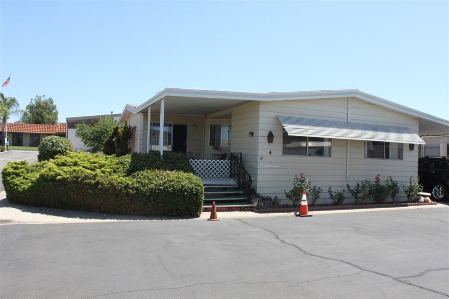 Corner lot, triple wide unit in a the Beautiful Ramona Terrace Estates. New carpet, new flooring, new paint, new lighting fixtures, new ceiling fans, new water heater, new stainless steel refrigerator, new counter tops, light and bright. 2 walk in closets, MBR has lighted walk in closet. Wheel chair ramp. MBR has a walk in tub and a shower. Covered deck in front to sit and have your morning coffee. Indoor laundry room with an office. Shed out back has Air Conditioning. Park has a pool. spa, & clubhouse.  Well maintained 55+ park with lots of activities. Recent upgrades, BUYERS MUST BE APPROVED BY PARK.   Information contained herein is deemed reliable but is not guaranteed. Buyer to verify sewer and septic information, utility availability and utility company information including but not limited to water, electric, gas, sewer, septic, cable and other communication services, Parking location, Before COE.   Public record information provided by third party. Agent has not verified public records, including but not limited to permits, lot size, number of rooms, age of property, zoning of property or square footage. Buyer to assume investigation of public records..  Neighborhoods: Ramona Terrace Estates Complex Features: ,,, Equipment:  Range/Oven, Shed(s) Other Fees: 35 Sewer:  Sewer Connected Topography: LL