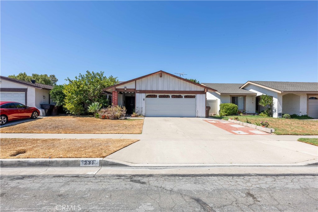 Spacious and full of potential, this 3-bedroom plus bonus room, 2-bathroom fixer-upper in Anaheim offers a rare opportunity to create your dream home. The property features generous living spaces including a welcoming living room with a cozy fireplace and a separate family room with striking beamed ceilings and a built-in bar—perfect for entertaining. The updated kitchen provides a modern touch and a great foundation for further customization. Additional highlights include an attached two-car garage, solar panels, patio backyard, ample storage, and a flexible floor plan ready for your personal vision. With its prime location and large living space, this home is a fantastic canvas for investors or buyers seeking space and value in a sought-after neighborhood.
