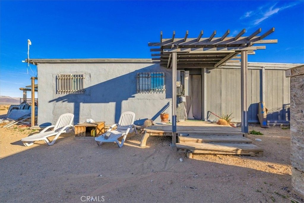 Photo of 5048 Godwin Rd, 29 Palms, CA 92277 (MLS # JT25278404)