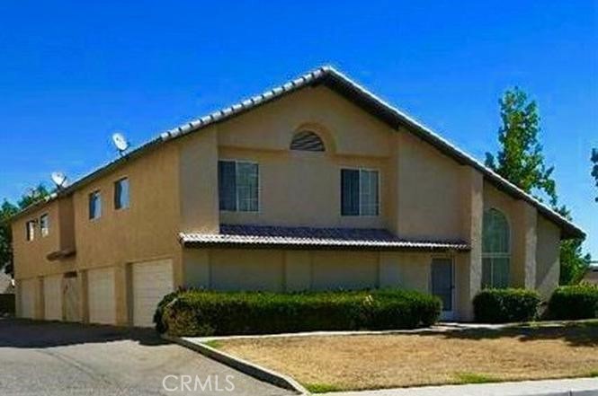 3 Bed 2.5 Bath Condo features wood floors, open floor plan, large bedrooms, two car garage.