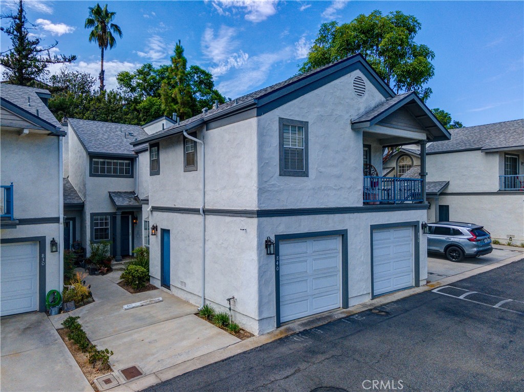 Welcome to this inviting 2-bedroom, 2.5 bath condo in the desirable gated community of Country Terrace in La Habra. Both bedrooms are located upstairs, each offering a private ensuite bathroom and a nice view of the community. The primary suite boasts a huge closet, while the secondary bedroom features a generous walk-in. A charming reading nook at the staircase landing is a sweet retreat when needed. Downstairs, you’ll find newer flooring in the entryway and kitchen. The spacious kitchen has ample cabinet space and upgraded PEX plumbing. The cozy living room offers a fireplace and dining area perfect for entertaining. A convenient half bath along with excellent storage under the staircase, and a new HVAC system (2023) are value-added amenities. The private back patio is ideal for relaxing outdoors. Country Terrace is a well-maintained community that offers wonderful luxuries, including a pool, hot tub, community room, green space, and plenty of guest parking. With just 70 units, it provides a peaceful neighborhood feel. The home also includes an attached one-car garage plus an uncovered parking space directly in front of the unit. HOA dues are affordable, and the location is close to shopping, dining, and everyday conveniences.