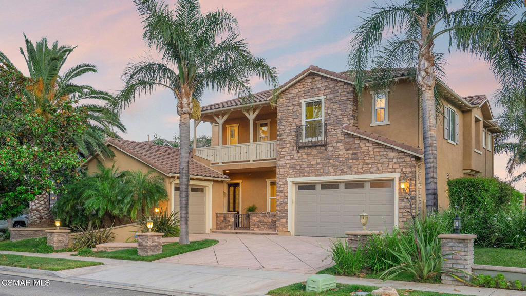 This picturesque 5-bed, 5-bath Wildhorse Canyon estate offers luxury, scale, and effortless indoor-outdoor living. A dramatic entryway with soaring ceilings and graceful archways sets the tone for sophisticated California living. Formal living and dining rooms flow into an open-concept kitchen and great room with custom cabinetry, Kitchenaid suite of stainless steel appliances, beautiful finishes, brand new quartz countertop, and a large center island. A spacious bonus room ideal for a home office or game room, a convenient powder room, and a private guest suite with ensuite bathroom offer flexibility for work and play.Upstairs, the luxe primary retreat features a formal sitting area, serene views, a generous walk-in closet, and a spa-style en-suite bath. Two additional bedrooms have a connected bathroom, with a third bedroom and bathroom rounding out the 4 bedrooms upstairs. A loft adds even more versatility -- perfect for a playroom, study nook, or additional lounge space.The backyard is the true showstopper, with a sparkling pool and spa featuring sheer descents, built-in BBQ, three fire pits, covered patio with fireplace, lush privacy landscaping, mountain views, and pool solar -- all designed for unforgettable entertaining. For car enthusiasts or those in need of extra storage, the property includes two garages: a spacious 3-car garage with room for a lift, and a separate 1-car garage ideal for a collector car, workshop, or home gym.A rare opportunity to own a resort-inspired retreat in one of Simi Valley's most coveted neighborhoods. *Furnished photos have been virtually staged.