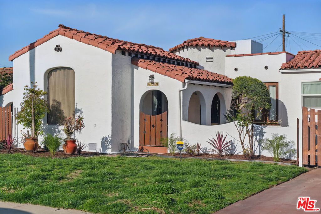Welcome to this beautifully remodeled Spanish-style gem, blending timeless charm with modern upgrades. From the moment you step inside, you'll appreciate the open-concept kitchen featuring brand-new cabinetry, sleek quartz countertops, stainless steel appliances, and updated fixtures, perfect for both everyday living and entertaining. Freshly painted inside and out, the home showcases restored original hardwood floors and solid wood doors that bring warmth and character to every room. Both bathrooms have been completely renovated with new tile, vanities, glass enclosures, and designer fixtures. Enjoy comfort year-round with central A/C and heat, a brand-new garage door, copper plumbing, and a fully rewired electrical system with a 200-amp panel. Step outside to the detached garage with ADU potential, into a low-maintenance backyard with new artificial grass, ideal for relaxing or hosting guests. Located within walking distance to SoFi Stadium, the Intuit Dome, and close to shops, schools, and major freeways, this home offers the best of city living in a vibrant neighborhood. You don't want to miss your chance.