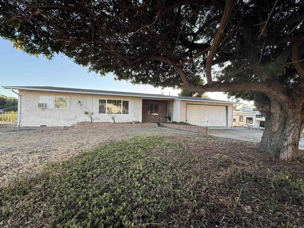 Rare Investment Opportunity – Two R-2 Zoned Lots Included! Truly a one-of-a-kind property offering exceptional value and endless potential. You get two separate lots for the price of one! With a combined total of 38,524 square feet across two APNs, this is a dream opportunity for developers, investors, or savvy buyers looking to expand, build, or generate rental income. Each lot is zoned R-2, allowing for multi-unit development—perfect for duplexes, ADUs, or custom income properties (buyer to verify). The existing home features 1,952 square feet of space, including a full-size basement with a separate entrance, ideal for converting into a rental unit, in-law suite, home office, or creative studio. The basement is a blank canvas ready for your vision. Whether you're looking to live, rent, build, or all three, this is a rare chance to own a versatile property with major upside. Opportunities like this don’t come around often...don’t miss it!