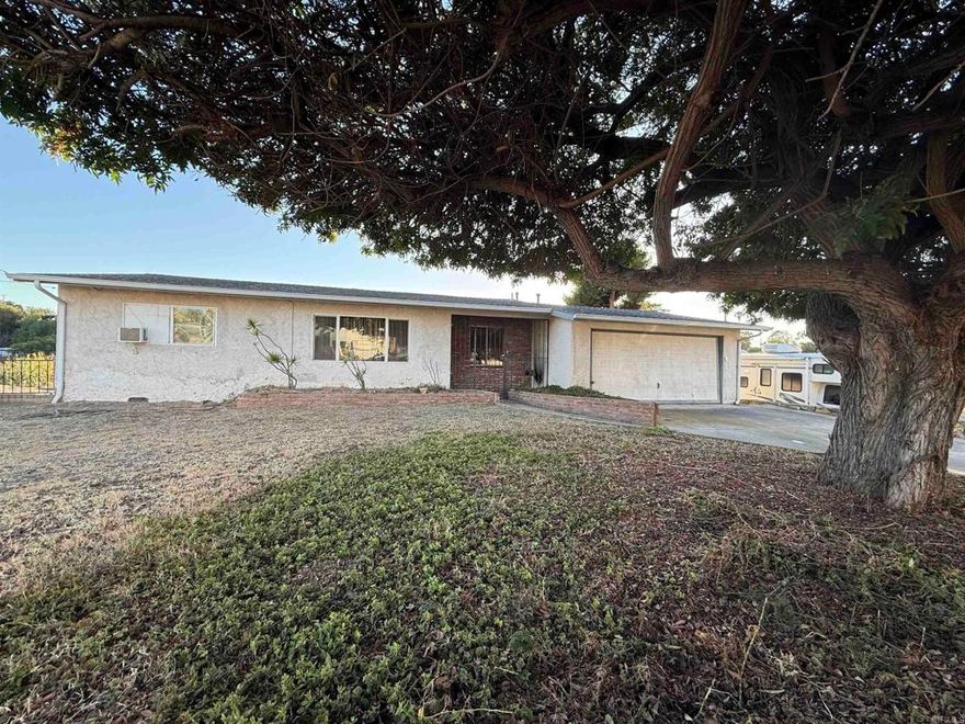 Rare Investment Opportunity – Two R-2 Zoned Lots Included! Truly a one-of-a-kind property offering exceptional value and endless potential. You get two separate lots for the price of one! With a combined total of 38,524 square feet across two APNs, this is a dream opportunity for developers, investors, or savvy buyers looking to expand, build, or generate rental income. Each lot is zoned R-2, allowing for multi-unit development—perfect for duplexes, ADUs, or custom income properties (buyer to verify). The existing home features 1,952 square feet of space, including a full-size basement with a separate entrance, ideal for converting into a rental unit, in-law suite, home office, or creative studio. The basement is a blank canvas ready for your vision. Whether you're looking to live, rent, build, or all three, this is a rare chance to own a versatile property with major upside. Opportunities like this don’t come around often...don’t miss it!