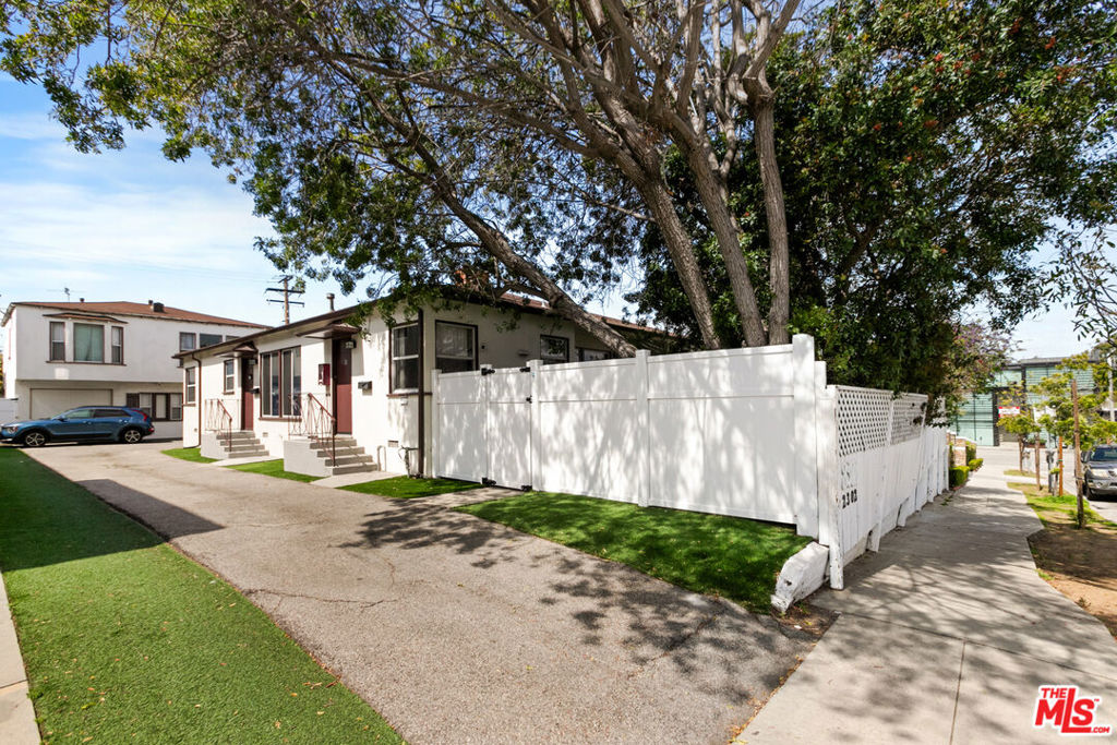Built in 1938, this property has been meticulously maintained with modernized interiors and still possesses its vintage charm. 2302 32nd Street sits on a large 9,000 Square Feet lot with a total of three structures. The front building contains ThreeUnits, (1) Two Bedroom One Bathroom Unit and (2) OneBedroom One Bathroom units. The middle structure of the lot is Two Stories with (1) Large One Bedroom One Bathroom unit located upstairs, and downstairs is (1) non-conforming OneBedroom One Bathroom unit. The seller has plans and permits for the 5th unit that will allow an easy process of registering the non-conforming unit with the city. The property also provides a total of 7 parking spaces. Conveniently located just south of Pico Boulevard and theI-10 Freeway, tenants of 2302 32nd Street have no shortage of things to do. From vibrant nightlife to an ample selection of fine dining, daily necessities, and retail amenities. Providing easy access to all that Santa Monica has to offer as well as seamless transit to the surrounding West Los Angeles area.2302 32nd Street offers a unique opportunity to traditional or owner-occupied investors alike. The asset offers a cash-flowing stabilized investment alongside potential to convert as well as add additional ADU's on the premises.