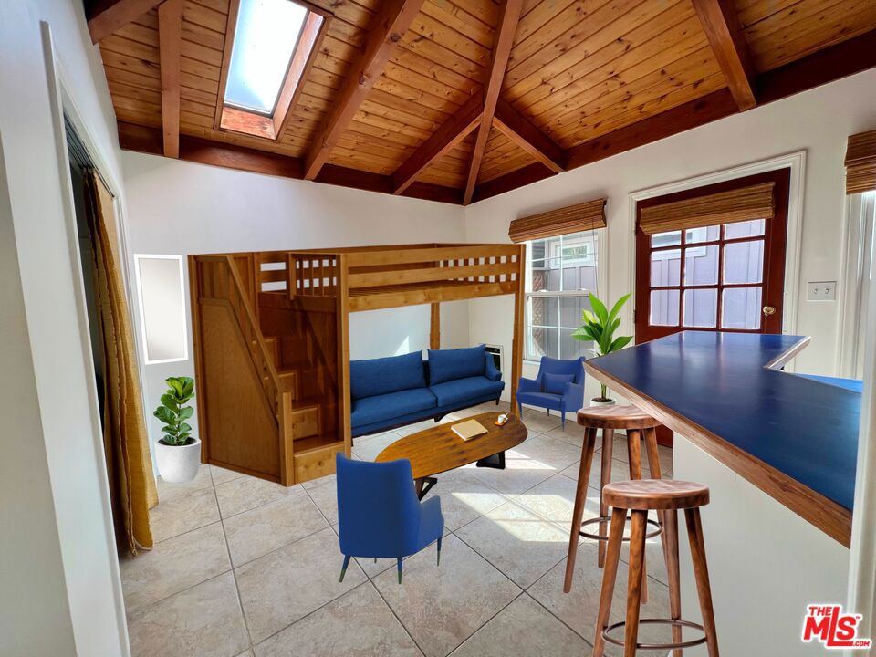Embrace coastal living in this charming stand-alone bungalow steps from Santa Monica's famed beaches. Savor your mornings on the private front patio in this absolutely unbeatable beachside location! A bright and airy haven with high ceilings, a skylight, and plenty of windows with custom shades. This unit exudes a beachy ambiance with blue countertops and natural wood accents! Boasting abundant closet space and a stylishly renovated shower. Enjoy the convenience of shared laundry, and regulated permit-parking.