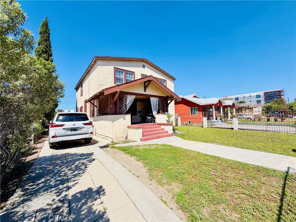 Photo of 3987 Halldale Avenue, Los Angeles, CA 90062 (MLS # DW26081327)
