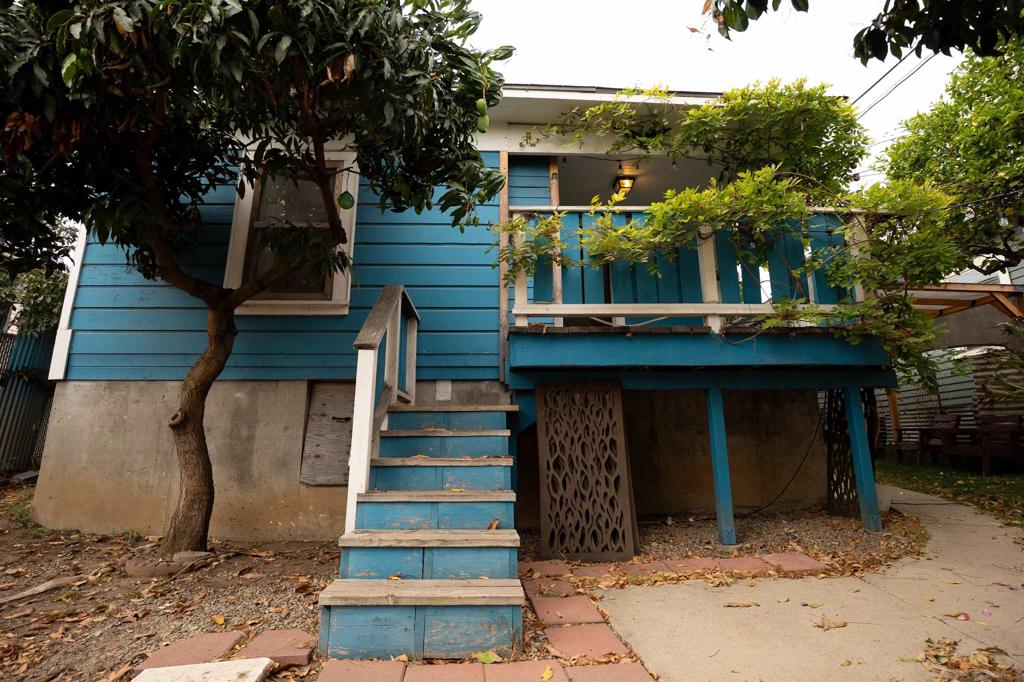 Charming Craftsman with Endless Potential Near Downtown San Diego. Welcome to this 2-bedroom, 1-bath Craftsman home with an optional bonus room. Home is located just minutes from downtown San Diego. Featuring classic blue wood siding, this home exudes vintage charm and character. Inside, you’ll find a functional layout with new refrigerator and stove/oven included. A spacious unfinished basement, tall enough to stand in. The space offers excellent potential for storage, a workshop. The property offers ample yard space with mature fruit trees and convenient alley access, providing flexibility for parking or outdoor projects. While the home is in need of updating and TLC, it presents a fantastic opportunity to restore and customize a Craftsman-style residence. Close to freeways, shopping, dining, and San Diego’s downtown neighborhood. Minutes from the San Diego Airport. This home offers the opportunity to restore this gem and unlock its full potential!