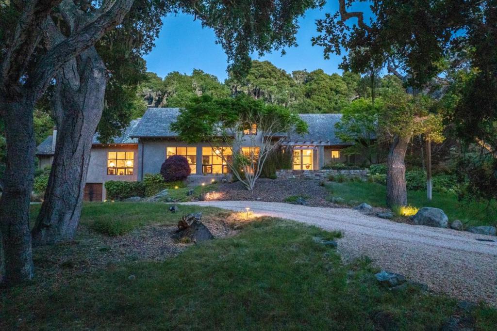 Discover this stunning custom-built home nestled on a sprawling 3.5-acre lot in Quail Meadows, perfectly embodying the California indoor/outdoor lifestyle. Property features rustic open-beam ceilings and hand-scraped walnut floors, beautifully complemented by modern Fleetwood sliding doors and windows. Designed for climate efficiency, with 8-inch foam-filled plaster walls, integral-color plaster interiors, and elegant finishes such as vertical grain white oak cabinetry and concrete counters. A separate 1 bedroom, 1 bath guest cottage mirrors the main house's exquisite design. The main residence includes a luxurious primary suite, spacious great room, chefs kitchen, office and a versatile loft or hobby room. Additional amenities include radiant heating, wine cellar, elevator, 4 fireplaces, central vacuum and AV system. Lush gardens, complete with a spa and waterfall are serviced by a well with a 10,000-gallon storage tank, adding to the property's self-sufficiency. This exceptional home offers unparalleled comfort and elegance, making it an ideal retreat for both relaxation and entertaining.