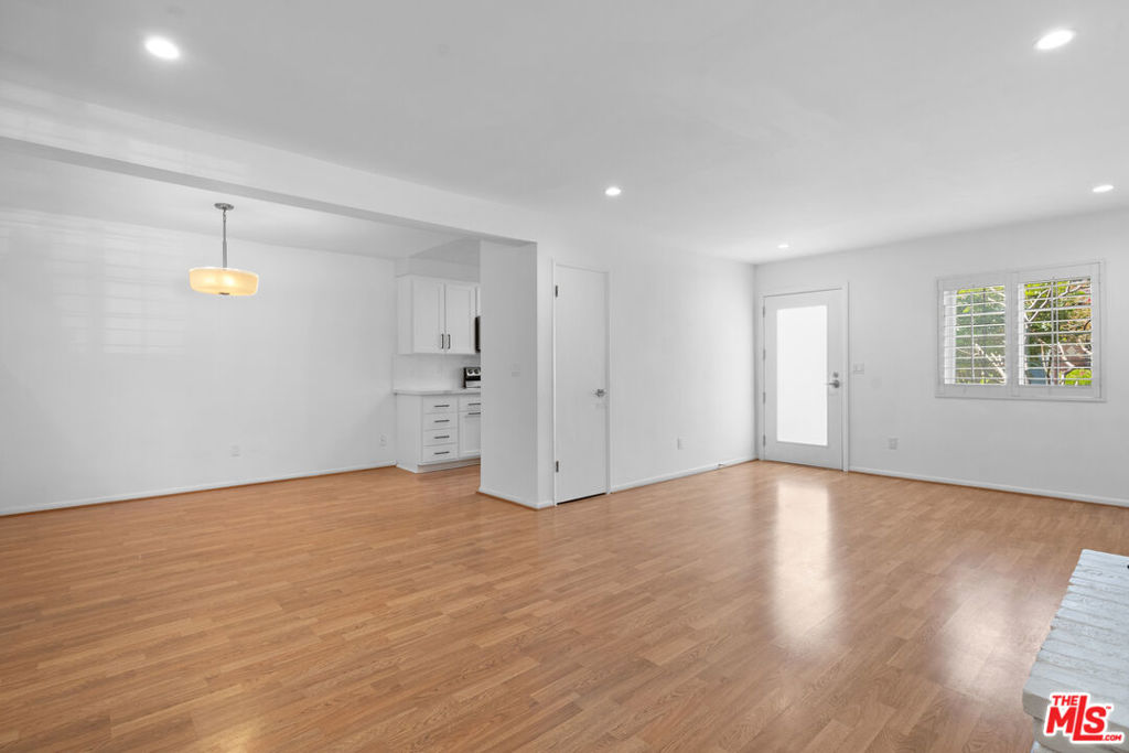 Modern, bright, and spacious corner 2 Bedroom/3 Bathroom townhouse unit that is completely renovated, has private patio space, and two parking spaces. Living spaces feature an open floor plan with wood flooring and recessed lighting with dimmers. The kitchen features white quartz countertops, stainless steel appliances, modern white cabinetry, and a new sink with a high-end faucet and hardware. The dining area is separate from the kitchen and has a modern light fixture. The downstairs bathroom is perfect as a "guest bathroom" away from the bedrooms and has a new vanity with stylish lighting and hardware. Bedrooms are spacious and have windows with shutters that allow for lots of natural lighting. The primary bedroom has an en-suite bathroom with a new custom vanity, a spacious shower with new tile walls and flooring, and a glass enclosure. The second upstairs bathroom has a new quartz countertop vanity with new hardware, and a large tub that is also a shower with new tiling. Condo community features on-site laundry and two tandem parking spaces in a gated garage. The property is located centrally in Playa Del Rey with easy access to the beach and to the Westside. Short drive to El Segundo, Westchester, Playa Vista, Marina Del Rey, and Venice. Enjoy a modern living experience in a gorgeous and recently renovated townhouse home near the beach!
