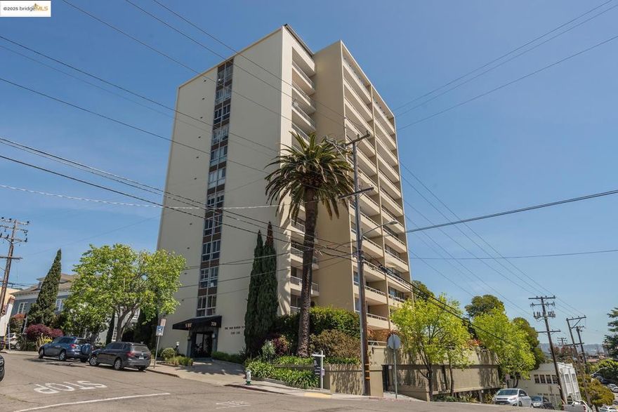 Almost entirely original, 2nd floor unit in one of Adams Point's most coveted mid-century buildings. Floor to ceiling, south-facing windows and balcony. White-oak flooring and carpeting. Many of the original installations in kitchen, bath and throughout.  The building offers a gated garage with assigned parking, secure keyed elevators, app-based laundry facilities, additional locked storage, a welcoming lobby, outdoor terraces, and gated bike storage. Van Buren Tower is pet-friendly and includes EV charging stations.  The location provides exceptional convenience. Whole Foods and Trader Joe’s are just blocks away, and the weekly farmers market offers fresh produce and local goods. Popular restaurants such as Lake Chalet, Grand Lake Kitchen, 389, Comal, and Sidebar are nearby. Outdoor recreation is close at hand with Lake Merritt and Redwood Regional Park, along with easy access to public transit and BART for commutes throughout the Bay Area.  No open houses. Tenant occupied. Appointment required. Views:  Downtown