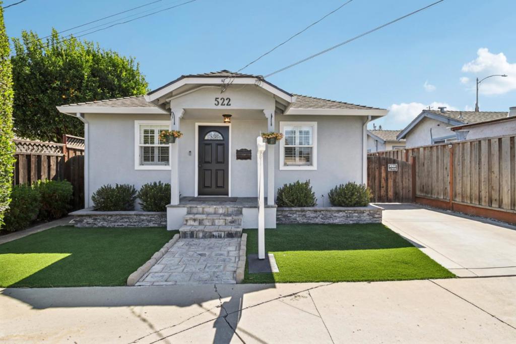 Welcome to 522 Gregory Street, a delightful 3-bedroom, 2-bath bungalow located within the highly sought-after Willow Glen school district. This updated home offers classic curb appeal with fresh exterior paint, smooth stucco finish, and low-maintenance astroturf in both the front and backyard. Inside, you'll find crown molding, elegant baseboards, and stone countertops that blend modern comfort with timeless charm. The private backyard is perfect for relaxing or entertaining, featuring a spacious deck, manicured turf lawn, and a custom putting green for golf enthusiasts. The detached garage has been transformed into a stylish man cave ideal for hobbies, home gym, or office space. Conveniently located near major freeways and commuter routes, this home combines lifestyle, location, and charm in one turnkey package.