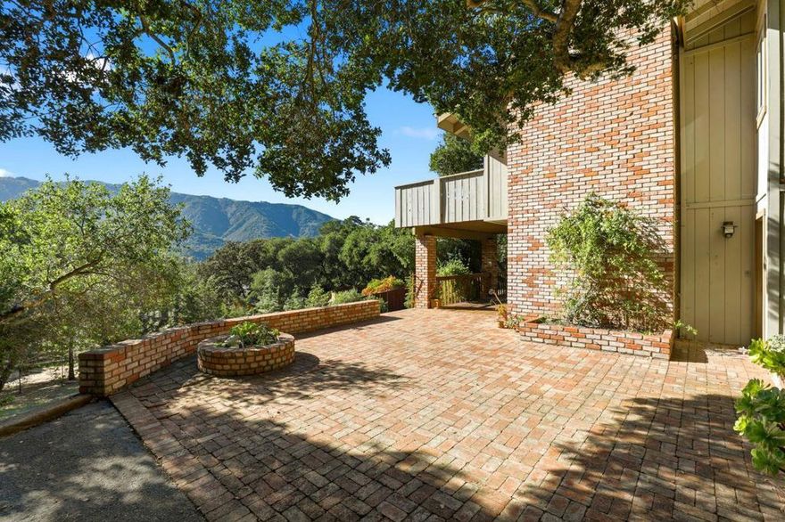 First time on the market! Discover Carmel Valley charm at 53 La Rancheria, nestled in a beloved Firewise community that blends natural beauty with peace of mind. Become a part of the La Rancheria Renaissance in a neighborhood experiencing a beautiful revitalization!   This spacious home offers a flexible floorplan ideal for separate living spaces or creative use. The upper level features 2 bedrooms, 2 full baths, vaulted ceilings, and a sunny deck. The lower level includes 2 bedrooms, 1 full bath, a den, a living room, and a second kitchen, with both interior access and a separate entrance offering privacy and convenience. (Downstairs kitchen completed without permits.)   Priced with guidance from a recent estate appraisal of $1,975,000, this unique property offers endless potential in one of Carmel Valley's most sought-after enclaves.  (11/15/25 - Property square footage has been updated to reflect Matterport Floorplan measurements completed November 2025.  Tax Record square footage reflects 2,714SF. Square footage not verified by listing agent. Buyer to do their own due diligence regarding square footage.)