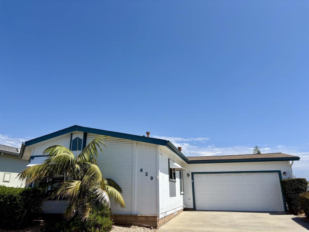 UPDATED 2 bed/2 bath Home with open floorplan, TROPICAL Yard and 2 Car Garage! Primary suite includes spa like bath with abundant storage, dual sinks, tub/shower combo, and massive walk-in closet! 2nd bath designed for accessibility with walk-in shower, built-in chair, handrail grips, and bidet! Updated kitchen with QUARTZ countertops and crisp white cabinetry! Large dining area with built-in buffet. large living room flows seamlessly into a sunlit bay window area, perfect for relaxing or entertaining. You will love the huge laundry room with front loading LG washer and dryer! Step outside to enjoy lush tropical landscaping and a private outdoor living space, ideal for morning coffee or evening gatherings. Active adult community! Move-in ready! Call now! CAL353616