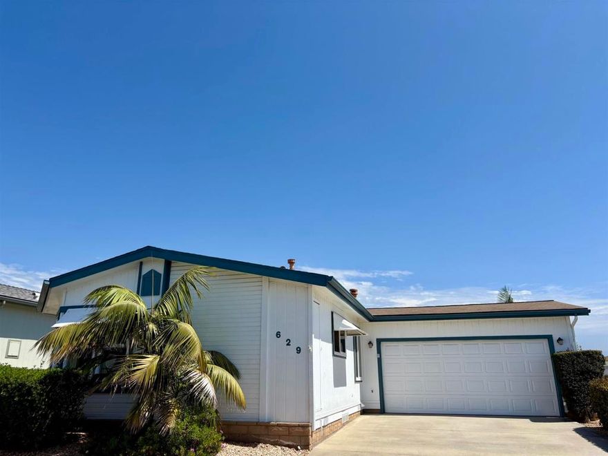 UPDATED 2 bed/2 bath Home with open floorplan, TROPICAL Yard and 2 Car Garage! Primary suite includes spa like bath with abundant storage, dual sinks, tub/shower combo, and massive walk-in closet! 2nd bath designed for accessibility with walk-in shower, built-in chair, handrail grips, and bidet! Updated kitchen with QUARTZ countertops and crisp white cabinetry! Large dining area with built-in buffet. large living room flows seamlessly into a sunlit bay window area, perfect for relaxing or entertaining. You will love the huge laundry room with front loading LG washer and dryer! Step outside to enjoy lush tropical landscaping and a private outdoor living space, ideal for morning coffee or evening gatherings. Active adult community! Move-in ready! Call now! CAL353616