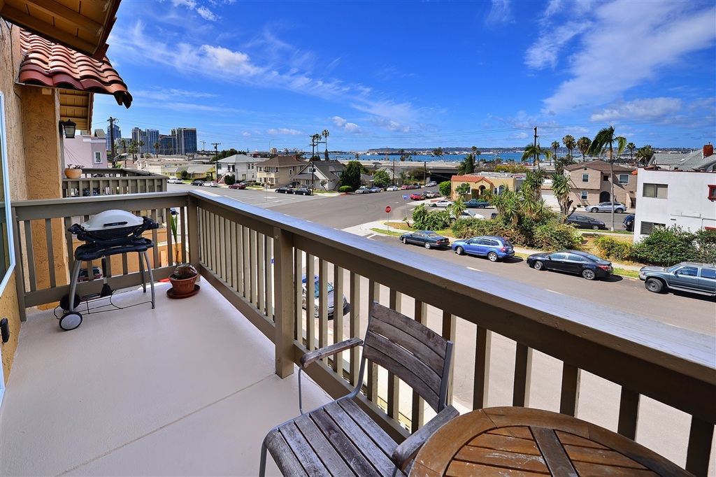 This unit is a must see! Very clean, modern and $30,000 in updates. You will love the sunset and downtown views from your top floor balcony. The views are amazing! Move in ready. Only 9 units in this complex, which makes downtown living cozy yet easy accessible to all that DT, Bankers Hill, Little Italy & Balboa Park have to offer. Biggest unit in complex, almost 1000sf! Garage is split with another unit. Fireplace and laundry in unit. Peaceful common area, low HOA. Turn your keys and feel at home. Neighborhoods: Bankers Hill Equipment: Dryer, Range/Oven, Washer Other Fees: 0 Sewer: Sewer Connected Topography: LL