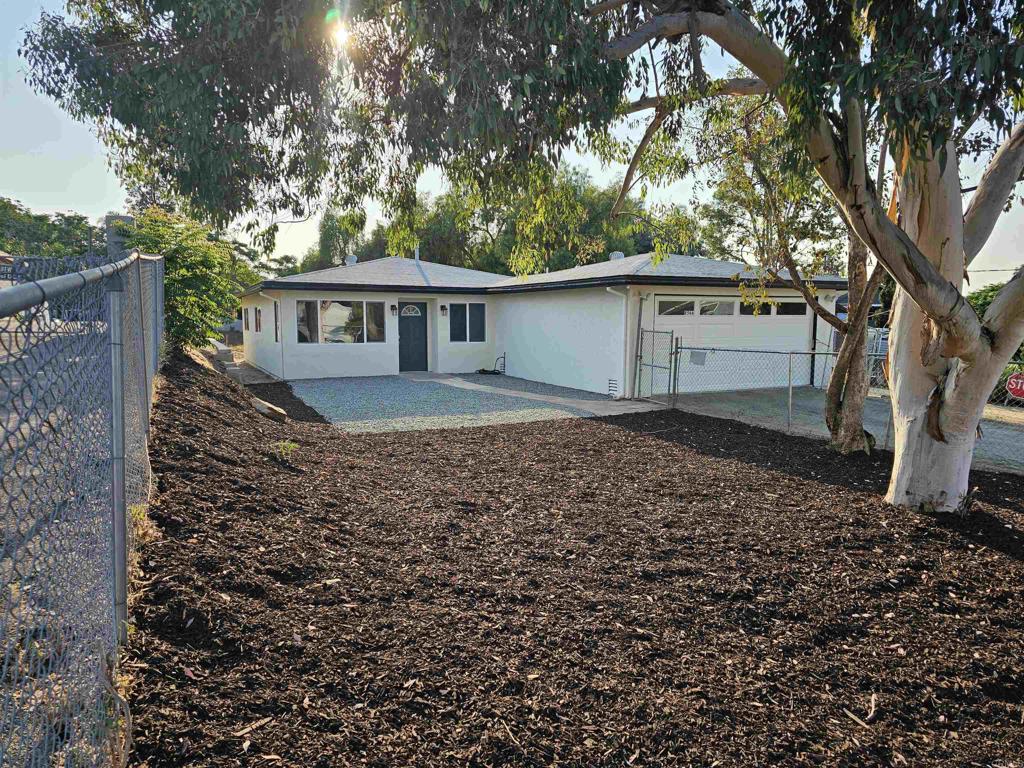 Welcome to 8566 Atlas View Drive, a beautifully remodeled gem that sits on a huge 1/2 acre lot nestled in the heart of Santee, CA. This turnkey home blends modern updates with everyday comfort, offering a move-in-ready opportunity in one of East County’s most convenient locations. Just minutes from the 52 and 125 freeways, commuting is a breeze while still enjoying a peaceful, residential neighborhood setting. Set on an expansive lot, this property offers endless potential. Whether you envision building an ADU for extended family or rental income, installing a sparkling pool, or creating your dream outdoor living space, there’s still plenty of room left to enjoy a spacious yard, garden, or play area. The possibilities are truly wide open. Step inside to discover a fully remodeled interior featuring stylish finishes, new flooring, an updated kitchen with quartz countertops and stainless steel appliances, and refreshed bathrooms that bring a modern, clean feel. With a light and airy floor plan and thoughtful upgrades throughout, this home is perfect for first-time buyers, growing families, or anyone looking for low-maintenance living with high-impact style. Enjoy the best of both worlds: a generous lot with room to grow and a turnkey home that’s ready today. Don’t miss your chance to own a slice of Santee with space, style, and unmatched potential.