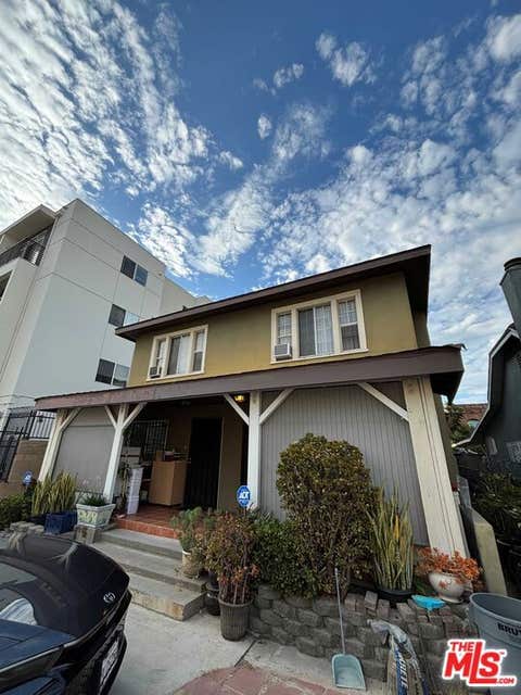 Photo of 3055 W 12th Place, Los Angeles, CA 90006 (MLS # 26867529)