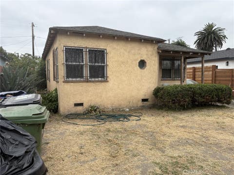 Photo of 922 E 97th ST, Los Angeles, CA 90002 (MLS # PW26156803)