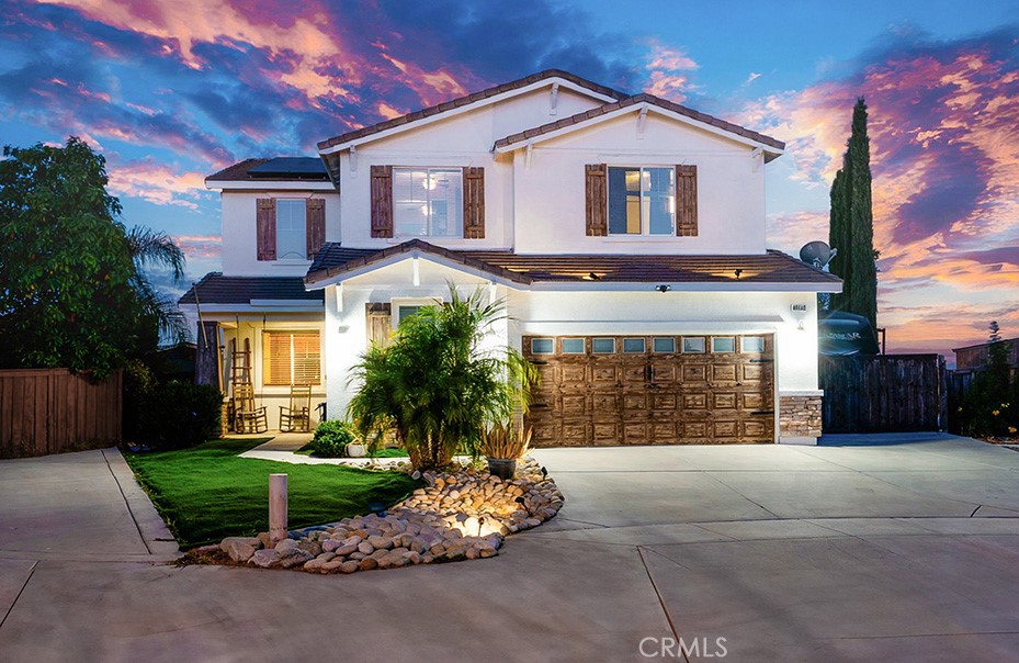 Welcome to 40148 Emily Place, a stunning turnkey two-story home tucked away at the end of a cul-de-sac in the heart of Murrieta. Situated on a desirable corner lot, this property offers some of the most breathtaking views in the Inland Empire—imagine waking up to hot air balloons drifting across the morning sky. Inside, this beautifully updated home features 4 spacious bedrooms, 3 full bathrooms, a large loft, a private theater room for the ultimate movie-night experience, and a huge, expansive master suite that serves as a luxurious retreat. The gourmet kitchen is perfect for entertaining, complete with a large island, high-end appliances, and elegant quartzite countertops. Every detail of the home has been thoughtfully upgraded from top to bottom, ensuring a true move-in-ready experience. The open layout flows seamlessly into the backyard oasis, where you’ll find a sparkling in-ground pool and spa, a large covered patio, and a custom built-in outdoor kitchen—perfect for gatherings or enjoying the California lifestyle year-round. Additional upgrades include fully owned solar panels that substantially reduce energy costs, a whole-house water filtration system, and an oversized garage with dedicated RV and boat parking. Conveniently located near shopping, dining, and the Murrieta Hot Springs amenities, this home truly has it all.