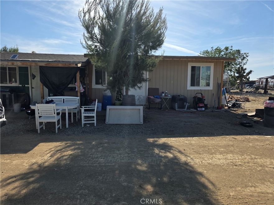 Paying too much for rent? Want to save on Rent? Here is this 1 bed 1 Bath Manufactured House with a lot of land to expand the construction. Perfect for a Single person or a couple. Want to build or put a Mobile Home! FIRT TIME Buyers, tried to buy a house but don't qualify! Here is this opportunity for you to become the owner in less than 30 day without having to apply with a Bank. Easy to negotiate a plan with the owner. Don't miss it. Buyers and Agents must use due independent diligence to know the use of land and availability of utilities.