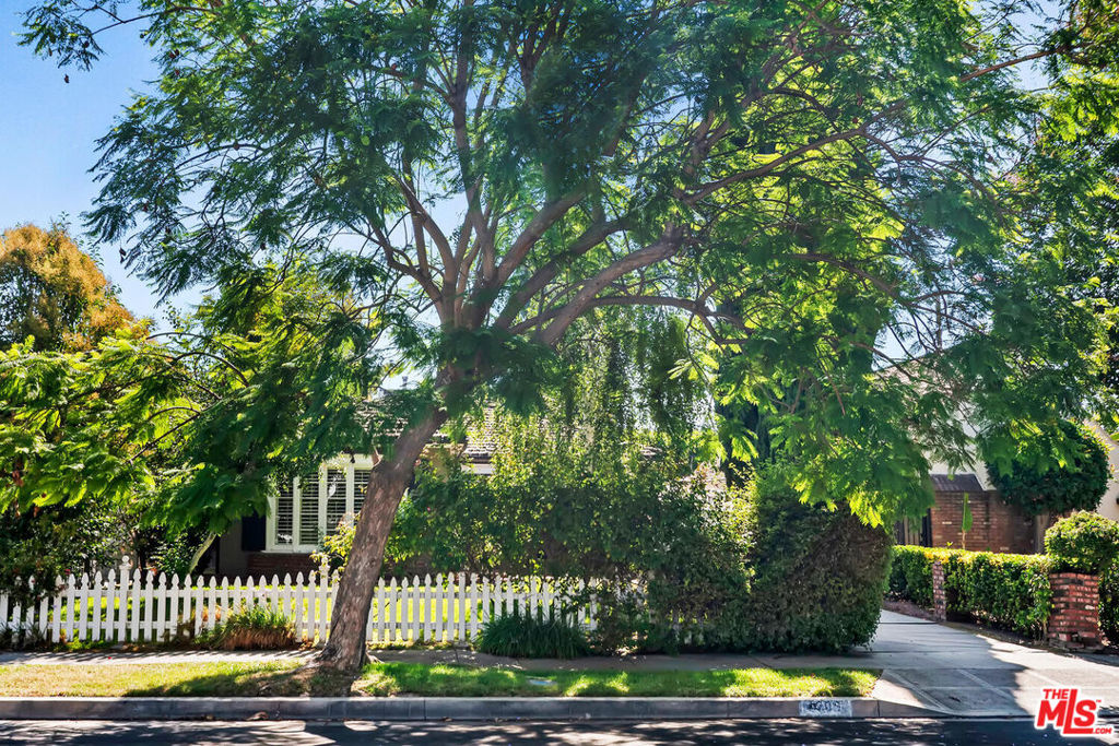 Presenting this dream opportunity for buyers and developers! Just listed and ready to ignite your creativity - 4208 Farmdale Ave is the hottest new listing in the heart of Studio City's Tujunga Village. Tucked away on the picturesque, tree-lined streets of Colfax Meadows, this delightful Traditional home offers a serene retreat in one of Studio City's most sought-after neighborhoods. Rare opportunity as it's the first time on the market in years. Located on a +/- 6761 SQFT lot, this 1593 +/- SQFT 2 bed / 2 bath + unpermitted guest house has so much charm and potential. Mature trees and a picturesque fence lead you to an inviting home with large windows pouring in light to the formal living and dining room. Fall in love with the original hardwood floors throughout. The kitchen is adorable with classic black and white tile flooring and farmhouse style decor including light fixtures and retro range. There is also a laundry room and bathroom off the cozy kitchen. The full bathroom features beautiful wallpaper, classic tile, a separate shower stall and tub. French doors lead to a spacious yard with an unpermitted guest house that was recently updated with a kitchenette and bathroom with shower. There is a nice sized driveway that leads to the detached two car garage. Sold as is. No seller credits or repair.
