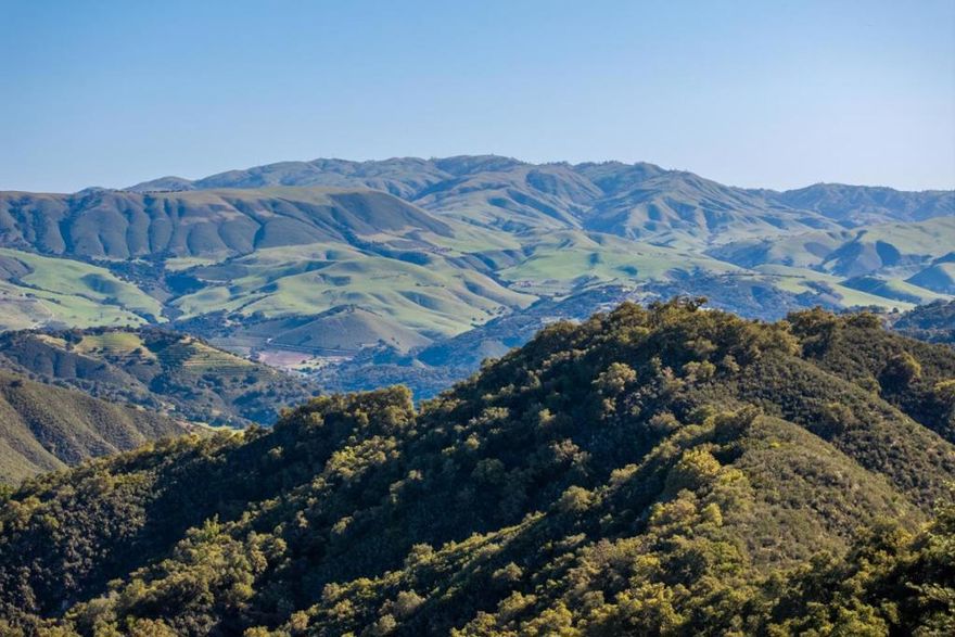 Enjoy your privacy behind secured gates of the Santa Lucia Preserve with mountain and valley views on this 45+- acre sun-drenched homesite. The generous 2.27+- acre homeland allows for a 1+ level main house, guest cottage, ADU, barn for horses, cars or other recreation, and part-time equestrian use. Large grasslands sprinkled with stately oaks create the perfect blend of filtered light, mild temperatures and a diverse living space surrounded by nature. The Preserve is a premier private 20,000-acre community limited to just 300 owners with world-class amenities including a top-rated Tom Fazio golf course, 100 miles of scenic trails, equestrian center, fitness facilities, pools, tennis and pickleball courts, and a serene lake for relaxing, paddling and fishing. Resident services staff, a fire department and paramedics, fuel management plans, a surplus of water storage and additional safety measures are in place for your enjoyment of living in the exquisite natural setting. Experience the perfect balance of seclusion and convenience in this extraordinary community. Utility conduits, water and fiber optics are brought to the lot at the beginning of the homesite.