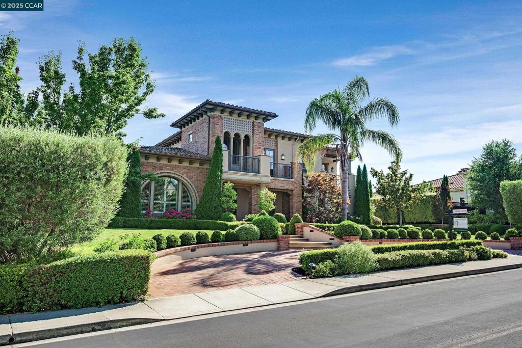 Find modern Mediterranean elegance in the coveted, gated community of Alamo Springs. This stunning home blends luxury with comfort, featuring a large private bar that opens to a tranquil courtyard with fountain. Wine lovers will appreciate the 650+ bottle wine room. No detail has been overlooked with high-end finishes throughout. The gourmet kitchen is a chef’s dream, equipped with professional-grade Thermador 6-burner gas range with griddle and double ovens, oversized refrigerator, and two Miele dishwashers. The serene primary suite boasts a cozy fireplace and breathtaking views—keep an eye out for roaming wildlife from the nearby preserve, camel anyone? Each upstairs room offers scenic views and en suite bathrooms. The loft has exceptional light and can double as an art studio. Step outside to a spectacular backyard oasis with pool, spa, putting green, and an expansive terrace with full outdoor kitchen and built-in BBQ—perfect for entertaining. A whole-house generator will add peace of mind. This exceptional home defines luxurious California living. **Please not that this beautiful home looks like it will have I680 noise. It does not, because of the topography! Absolute must see!