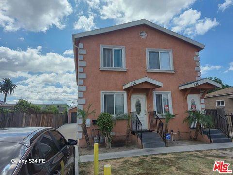 Photo of 136 W 97th Street, Los Angeles, CA 90003 (MLS # 26635793)