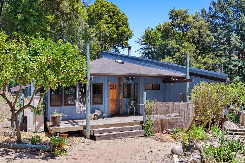 There is a reason why these Aptos hills are the destination for local retreat centers & for nature lovers alike. Just minutes to the Aptos Village, yet peace & serenity are abound here. At 2020 Sparrow Valley you will see how this property was designed to flow w/ the natural surroundings. Inside the home, the vaulted ceilings, the many skylights & the numerous windows welcome in the south sun & add to the expansive & vibrant energy here. In the heart of this home is the remodeled kitchen with its beautiful quartz counter tops, rough edge back splash tiles, & rich cherry cabinets. The versatility of this property shines bright with an attached office, a detached 4th bedroom, a stand alone modern storage shed & a music studio that is tucked away from the main home. There is also a beautiful studio apartment with its own kitchen & full bath that is full of potential. Come here to smell the flowers, to pick fruit, to soak up the sun. Come here to find your flow. Come here to return home.