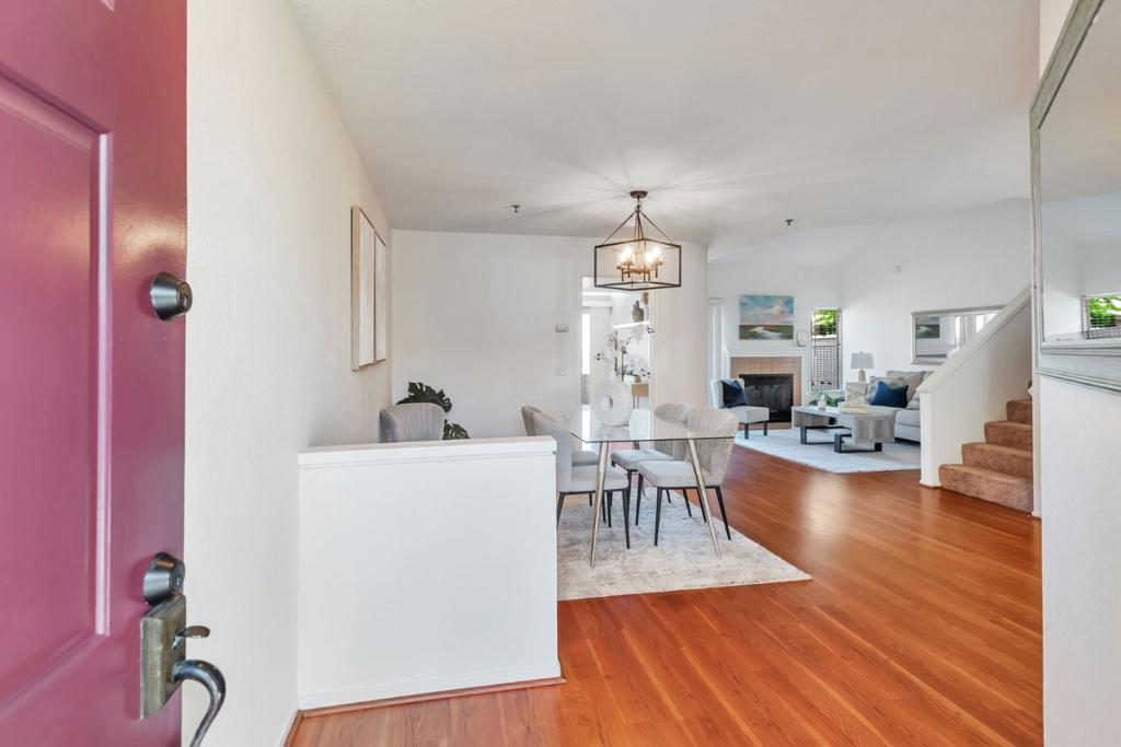 Incredible opportunity to own this gorgeous 2Bedroom+Den/Office, 3 full baths townhouse with attached 2-car garage and breathtaking SF Views! A large and inviting living room and L shape spacious dining area combination is graced with dramatic cathedral ceilings, laminate floors, fireplace and access to a large private deck which provides an entertainer's dream or a serene spot to relax and enjoy the beautiful views. Enjoy the large sun-drenched kitchen with ample cabinetry and counter space and access to the deck which makes it so convenient for barbecues and gatherings. The downstairs Den/Office could serve as an additional sleeping area and is conveniently located adjacent to a full bathroom. A separate utility room with washer/dryer and overhead cabinets leads to the large 2-car garage. Upstairs the elegant primary suite awaits you showcasing soaring ceilings, captivating views, dressing area with a walk-in closet and an additional closet both with custom built-ins and a dual-sink vanity. The second bedroom features its own bathroom and two closets with built-in organizers. New carpets in stairs and bedrooms. A true "Village in the Park" on San Bruno mountain surrounded by trees, walking trails, VIEWS, pool/spa & feels like an oasis. Near BART, shopping, San Francisco & SFO.