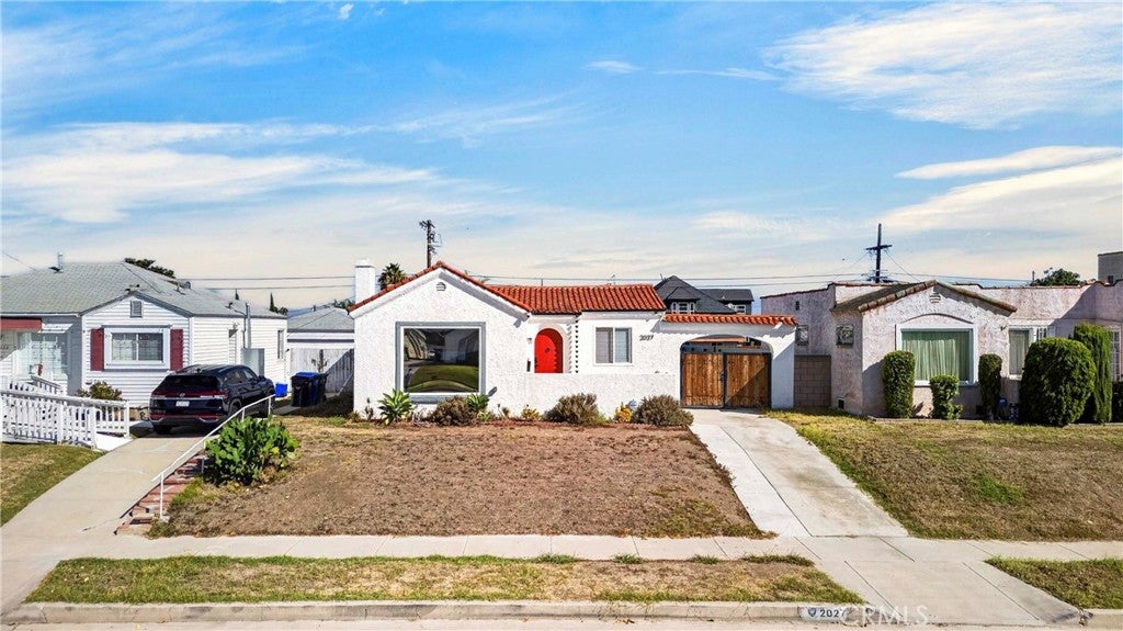 Photo of 2027 W 75th ST, Los Angeles, CA 90047 (MLS # PW26211135)