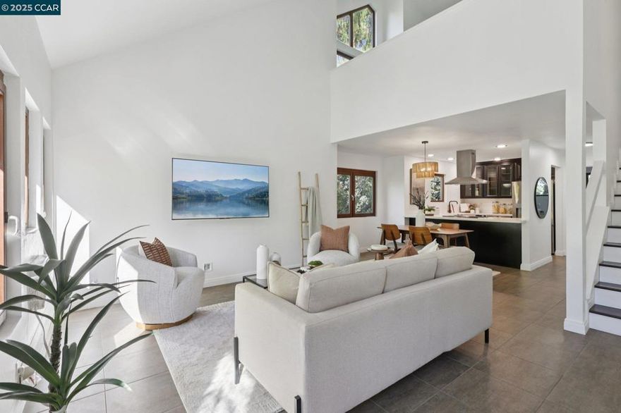 Imagine living in this exclusive retreat at the end of a cul-de-sac featuring soaring ceilings, windows with views to the majestic trees and peaceful landscape that has been tastefully remodeled from top to bottom! This end unit is filled with soft light and enjoys two ensuite bedrooms (or make one an office), with open floorplan, designer kitchen with quartz counters and stainless steel appliances and nearby laundry closet. You'll love sitting on the front patio adjacent to the greenbelt or relaxing on the balcony overlooking the trees with peek-a-boo views of Mt. Diablo. The designer bathrooms complete the feeling of escape as does the wooded pathways, swimming pool, picnic area, and basketball court in the complex. One-car garage and visitor parking at the end of a quiet cul-de-sac, yet near shopping, transportation, freeways, schools, hiking trails, and parks. Open house 10/11 & 10/12 1-4 pm