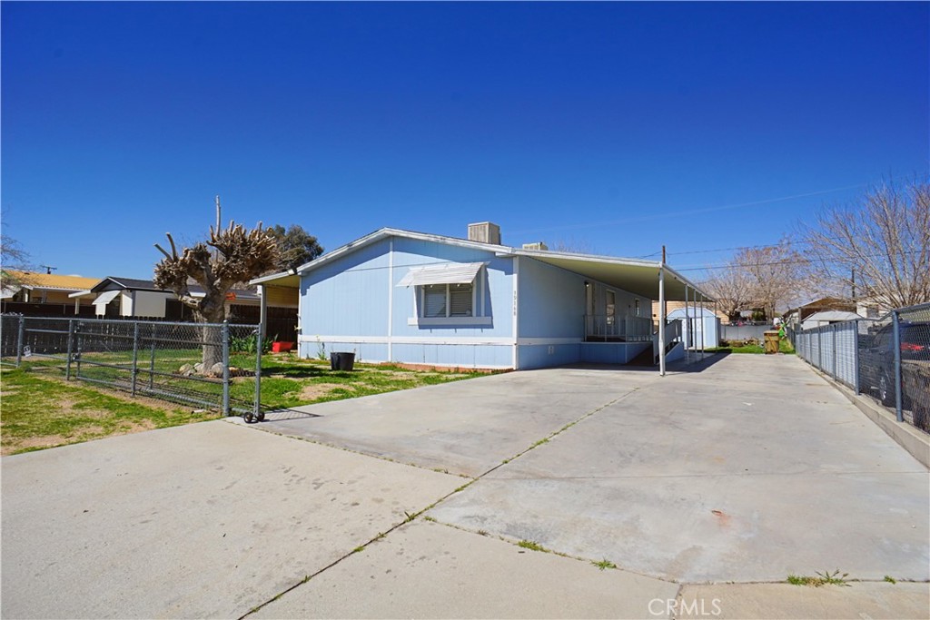 FOR SALE: ±1,512 Square Foot Manufactured Home with 433a recorded on Title. No land lease here. Minutes away from the Hesperia Golf Course and Hesperia Lake. Built in 1986 on a ±7,560 Square Foot Lot, fenced all around, with a spacious backyard in the City of Hesperia. The home purchase includes its large carport, covered patios, back shed, two points of access, spacious yard, and large driveway. There are 4 bedrooms, 2 bathrooms, living area, large kitchen with pantry, dining area, and inside laundry room, with lots of open space throughout. With a little updating, this home will be amazing. There is a ramp leading to the back entrance door and stairs to the front entrance. Double swamp coolers allow for great cool air flow during the summer months. Leased out for many years, the owner is now ready to sell to make this a home for the next buyer or a continued investment. This home is nearby all conveniences including retail, medical, freeway, schools, and recreation. Take a look today. Buyer to confirm all details to their satisfaction.