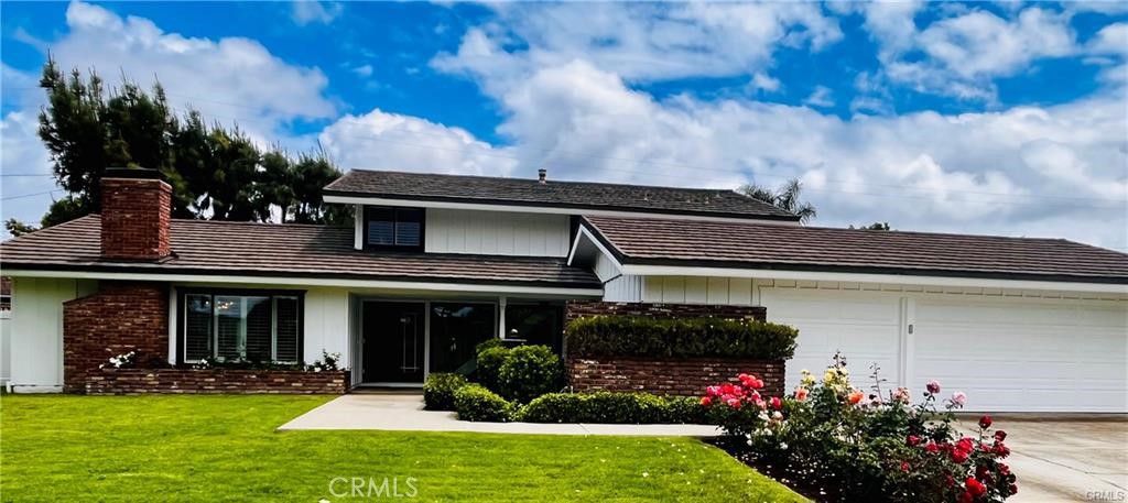 TURNKEY ! COMPLETELY REMODELED NORTH TUSTIN HOME ! DOWNSTAIRS PRIMARY BEDROOM ! SINGLE LOADED STREET ! NO NEIGHBOR IN FRONT ! Welcome Home ! 13772 Sanderstead is located in the highly sought-after North Tustin community & sits on a single-loaded street. This beautifully remodeled 4-bedroom, 2-bathroom residence exudes style & charm. Featuring a modern, open-concept floor plan, the home is enhanced with designer touches throughout, new flooring, fresh paint, and custom details — offering both elegance & charm in every detail. As you enter, you’re greeted by a formal entryway that seamlessly guides you into the spacious living area, where a cozy fireplace serves as the focal point. The kitchen has been beautifully remodeled & features elegant stone countertops, brand-new Samsung stainless-steel appliances, large kitchen island w/ wine refrigerator, & custom cabinetry. It opens to the dining & great rooms, creating the perfect space for hosting & entertaining.The dining room showcases a designer light fixture & offers the ultimate indoor-outdoor experience. French doors open to the entertainer’s backyard, seamlessly blending the two spaces for an ideal setting to enjoy both inside & outside living, The backyard has been meticulously designed w/ low-maintenance landscaping & feat. an outdoor fire pit providing the perfect spot for relaxation, offering complete privacy.The downstairs primary bedroom is generously sized, feat. new, extra large mirrored closet, recessed lighting, & direct access to the backyard. Its spacious design offers both comfort & convenience, creating a peaceful retreat w/ easy outdoor access.The downstairs primary bath is exquisite, feat. a luxurious steam room & shower combo. It boasts a new vanity with dual sinks & custom tile flooring & backsplash, creating a spa-like atmosphere with elegant, modern finishes.The second through forth bedrooms are impressively spacious, ea. feat. large mirrored closets, beamed ceilings, & an abundance of natural light. The secondary bath is stunning, showcasing a new Whirlpool bathtub & shower, along with a custom tile backsplash & vanity. The 2-car garage is notably spacious, providing ample room for extra storage. Additionally, the bonus room / den adds valuable square footage.This home is conveniently located to high-end shopping, popular restaurants, close to Beach Cities, and located w/ an award-winning school district !