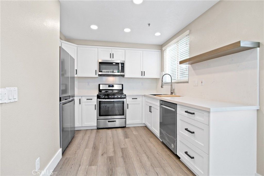 Photo of 16 Magellan Aisle, Irvine, CA 92620 (MLS # OC26071585)