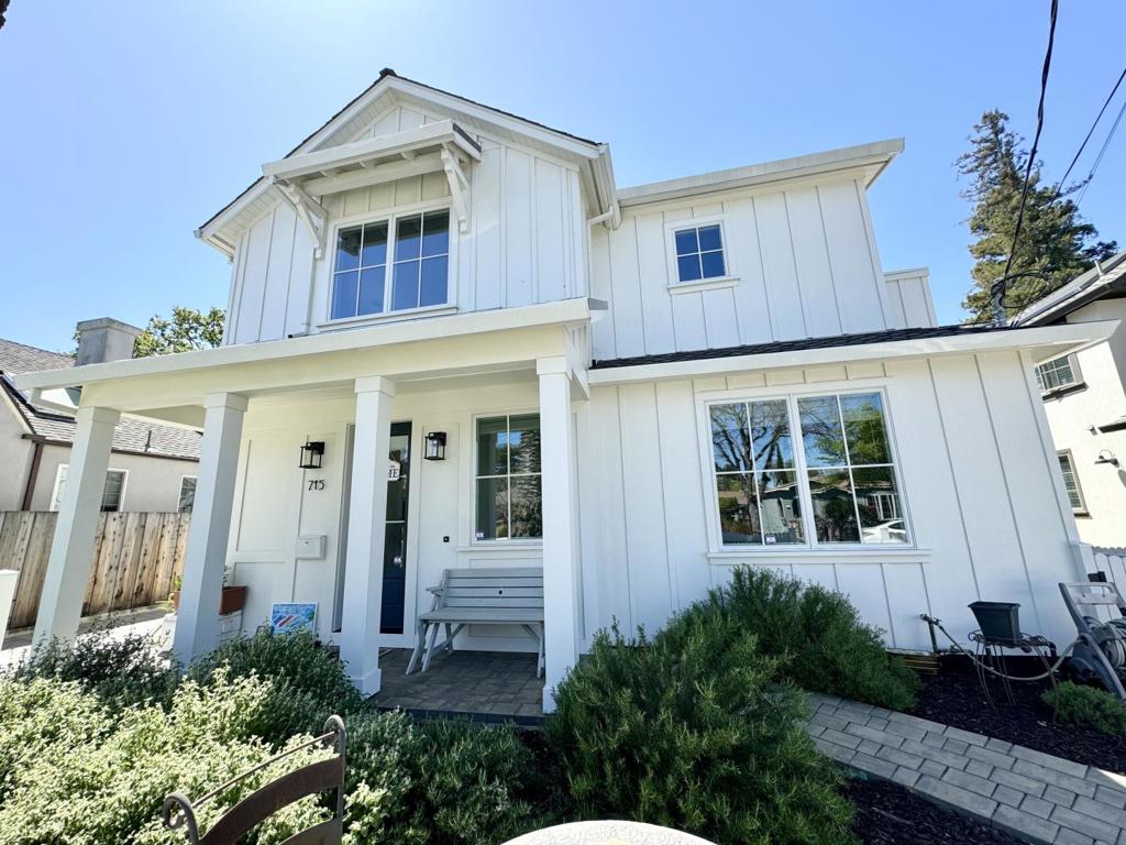 Offering the best of all worlds, 715 Linden Avenue has a classic farmhouse style that lives like a single-family home with contemporary finishes, and it is located at the heart of many conveniences. Built in 2021, there are thoughtful details throughout. The primary suite is spacious, and each of the home's 4 bedrooms has a walk-in closet. Designer finishes adorn the bathrooms that are right-sized for comfort. The ground-floor office can easily be used as a 5th bedroom. The open floor plan is well-designed, featuring a grand kitchen with gas range, a huge eat-in island, and a walk-in pantry. The first-floor half-bathroom with designer tile is conveniently-located at the entrance to the home. Don't miss the cozy, sun-filled window seat upstairs. Sharing just one wall, this duet property in a 2-unit HOA feels like a single-family oasis nestled between palm trees. Solar panels, upstairs laundry, an attached 2-car garage, deeded driveway parking, and welcoming front patio add the finishing touches. This premier location is within one-half mile of Washington Park, award-winning schools, and all that downtown Burlingame has to offer. Welcome home!
