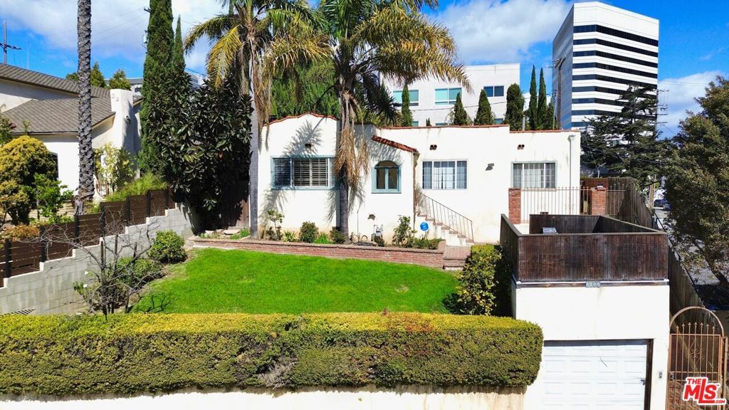 Photo of 1186 Mcclellan Drive, Los Angeles, CA 90049 (MLS # 25596129)