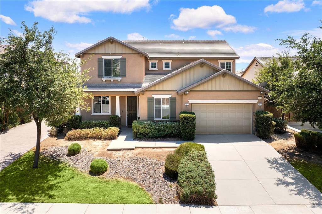 NEW FLOOR, NEW PAINTING. The former Lennar model home was built in 2017, located in the beautiful Harvest Villages in Jurupa Valley surrounded by mountains. The property offers 5 spacious bedrooms, 3 bathrooms. As you enter the long and inviting foyer you will pass by the downstairs bedroom and bathroom and the office room across from. Continuing through the foyer is the formal dining room, kitchen and the living room with abundant natural light. The loft on the second floor offers additional living space to use as you desire. The primary suite is oversized and feels like your own personal retreat. The primary bathroom is accented by dual sinks as well as a large soaking tub and separate shower. The primary walk-in closet is nearly as large as another bedroom with plenty of room for clothing and additional storage. The upstairs laundry room has ample space with built-in base and overhead cabinetry. Convenient access to the 15, 60 and 91 freeways. It will turn into a gem after some cosmetic upgrades.