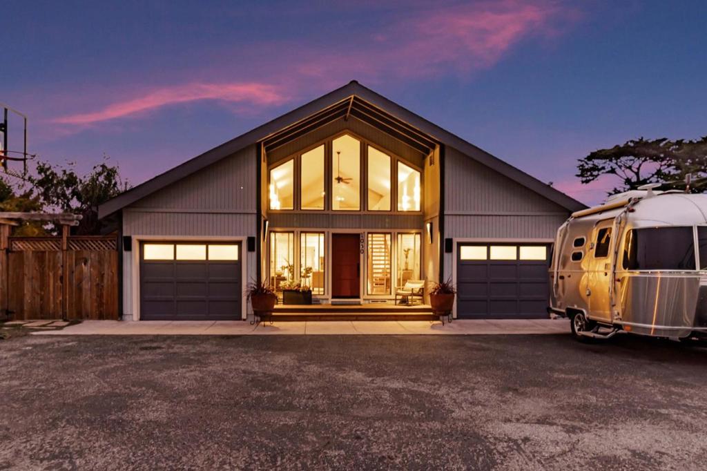 Beautiful 3BD/2BA, 1,960 sq. ft. coastal home just steps from Seal Cove and scenic trails in Moss Beach. Bright and airy with expansive windows, open-concept layout, and indoor/outdoor hardwired sound system. Enjoy a lush, private yardperfect for relaxing or entertaining. Originally a 2-car garage, one bay has been converted into a finished living space ideal for office, studio, or guest use; can easily be converted back. RV-ready parking includes 30 amp/120V hookup and direct sewer disposal. Flat lot in a prime location near cliffs, tide-pools, and hiking. Perfect as a peaceful retreat or a base for coastal adventure. A true California coastal gem! (Bonus garage space, primary bedroom, and guest bedroom virtually staged.)