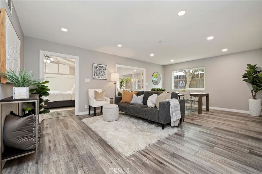 GORGEOUS UPGRADED AND REMODELD NORCO HORSE PROPERTY Located in a Cul-De-Sac! This home has something for everyone all in one spot. Centrally located near Ingalls Equestrian Center, Pumpkin Rock hiking trail, Community arenas open to public, freeways and horse trails.  As soon as you pull up you will notice the gorgeous plush landscaping with beautiful rose bushes and plants. This home has had a complete remodel in the last 2 years. The exterior has recently been repainted and a newer concrete driveway has also been installed. Once you walk in you will be delighted with all the upgrades the seller has done.  The kitchen is not only redone with new cabinets, they are CUSTOM cabinets that you will appreciate the craftmanship.  They also have pull outs making access inside easier. Soft close drawers and cabinets are perfect.  There is a gorgeous farmhouse sink adds charm and quartz counter tops.  All stainless steel appliances are Kitchen Aid. There are recessed lighting and newer ceilings fans through-out. You will love the open floorplan and the bonus room that tis 247 Sqft extra living space to enjoy.  The bathrooms have been updated and the guest bathroom has the most beautiful farmhouse vanity you will appreciate. The Primary bathroom has a walk in showers and has had a compete remodel as well. You will enjoy the light fixture that has different colors and music for you own private night club while taking a shower. Updated with copper plumbing, new 200 amp Panel, and all new sewer line as well. There is a whole house fan and new air conditioning. Outdoors are just as amazing that the indoors.  There are mature fruit trees such as , lemon, pumelo, blood orange, ann apple & navel orange. LOTS OF ROOM FOR HORSES Includes a 2 Horse MD BARN with 12x12 & 12x16  stalls with a 8x12 tack room .Include water and electric with a 12ft overhang.  There is also  a fully covered 16x16 pipe coral along with a 16x24 full cover coral.  Plenty of room for a sizable arena/turnout as well. There is a dog run and room for chickens.  The RV parking is 13 feet wide and the concrete  goes to the back so there is plenty of parking for all your toys/trailers.