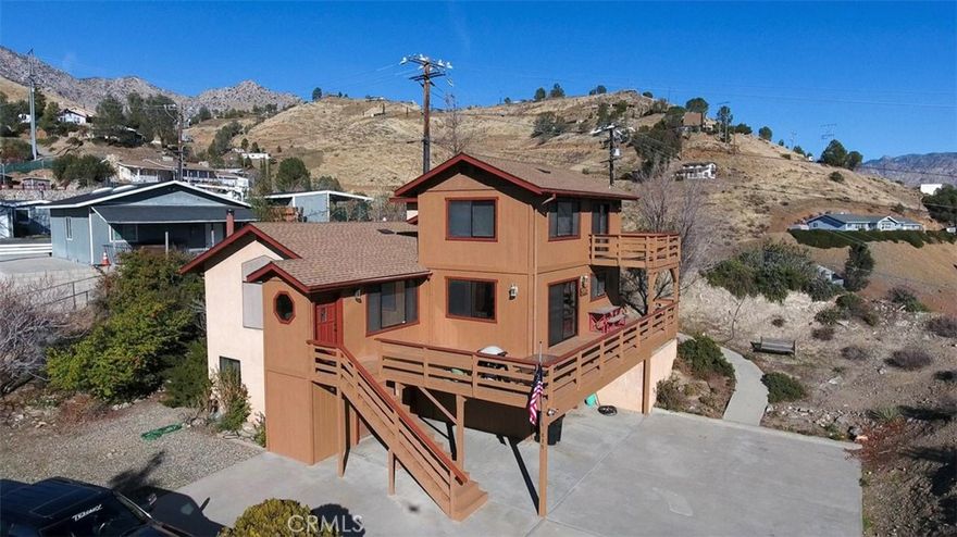 Welcome to your Lake Isabella Retreat!



Awaken to stunning views of Lake Isabella and transform this home into your personal retreat. The lake's beauty will inspire you every day. The impressive upper decks serve as ideal spots to take in the scenery of the Lake, with sunsets that are magical. For relaxation, a sauna is conveniently located in the garage, as is a 3/4 bathroom and laundry facilities. The concrete driveway provides ample parking options, including garages, beneath a portion of the deck, and on the side of the property. Alta Sierra ski resort is just a short 16-minute drive away off Hwy 155.



Large windows throughout the home provide abundant light into the living room, dining area, and kitchen, while offering picturesque views of the Lake and the surrounding hills. A skylight on the main level floods the hallway with ample natural light. The primary bedroom upstairs serves as a private oasis featuring vaulted ceilings, a spacious layout, and generous closet spaces. The bathroom is designed for comfort and relaxation, featuring a roomy shower, dual sinks, and a large tub with a glass block window that ensures light and privacy.



This must-see home is not just a place to live.