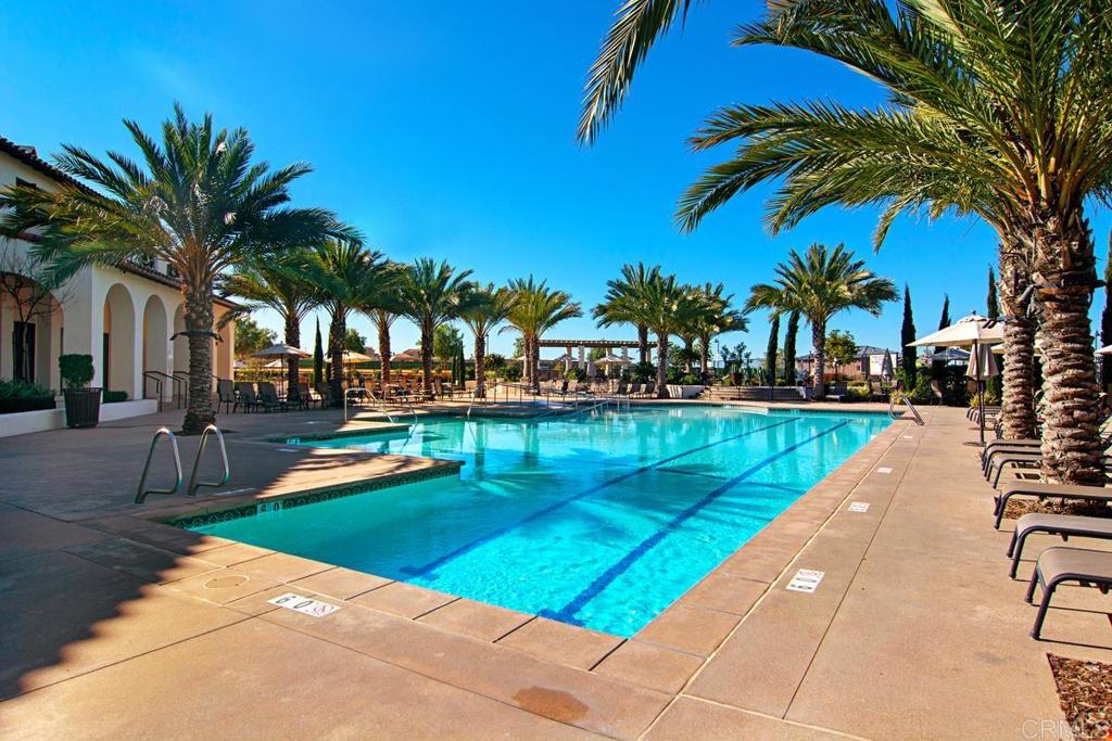Welcome to this stunning 5-bedroom, 4.5-bathroom single-family home located in the highly sought-after Village of Montecito in Chula Vista, CA. This luxurious property boasts a highly desirable floorplan with 2 full bedrooms and bathrooms on the first floor, an expansive 3,657 square feet of living space, offering plenty of room for both relaxation and entertainment. With a spacious 5,959 square foot lot, you’ll enjoy privacy and ample outdoor space to make the most of the beautiful Southern California weather. The home features a grand entry with high ceilings, a chef-inspired kitchen with premium appliances, and an open-concept living and dining area perfect for gatherings. The large windows throughout the home provide plenty of natural light and BREATHTAKING CANYON VIEWS, enhancing the sense of tranquility. The downstairs master suite is a true retreat, complete with a luxurious en-suite bathroom, walk-in closet, and views of the canyon below. Each of the four additional bedrooms is generously sized, offering comfort and privacy for family members or guests. The four and a half bathrooms are beautifully designed, with modern fixtures and finishes throughout. The home also includes a three-car garage, providing ample space for vehicles and additional storage. With its prime location in the prestigious Village of Montecito, this home offers a perfect blend of luxury, space, and scenic beauty. This is a plan 1 Bella Sitia floorplan that is extremely desirable and offers a full bedroom and private bathroom on the first floor. An attached junior ADU (Accessory Dwelling Unit) is also an option. Don’t miss the opportunity to own this exceptional property! A beautiful home with amazing views! Rare opportunity in Otay Ranch. Homes on the Canyon with views don't come on the market that often! Also located close to the cul-de-sac!