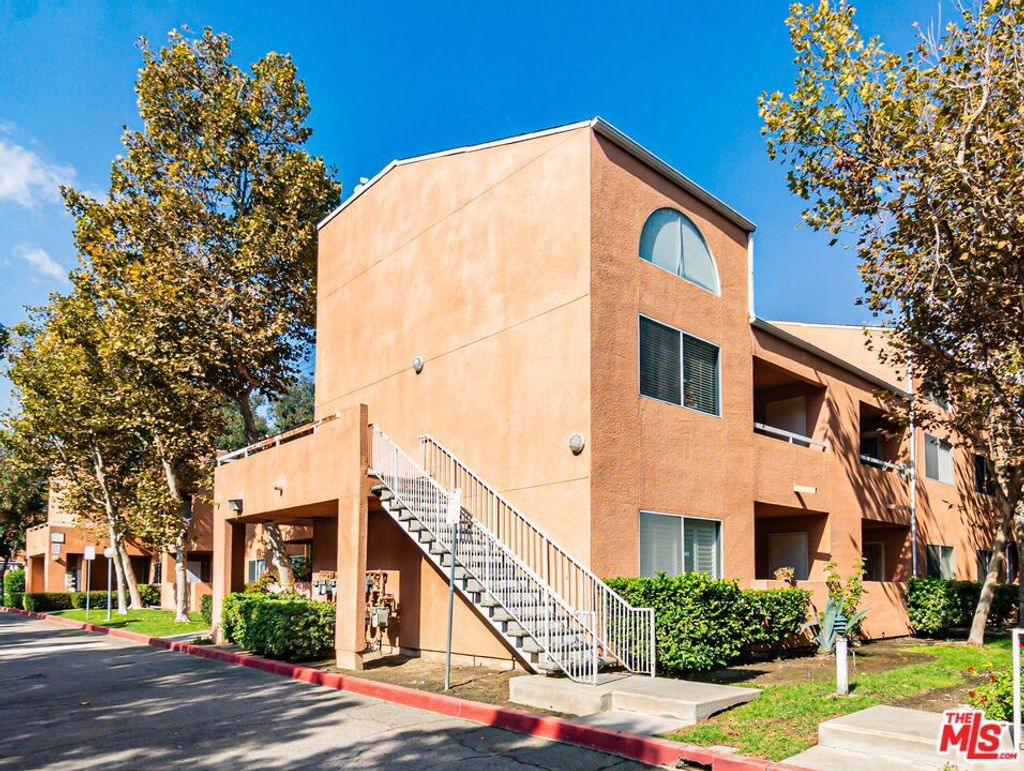 Photo of 12601 Van Nuys Boulevard #218, Pacoima, CA 91331 (MLS # 25611711)