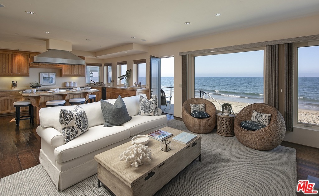 **CONTINUE TO SHOW** A place that truly celebrates the reason to call Montecito home, this 2 bed, 2 full/2 half bath Miramar Beach home radiates warmth with its sun soaked rooms, practical luxury with its seamless indoor/outdoor living, ideal floor plan, and elevated accommodations, and last, but not least, effortless relaxation with its soothing soundtrack of the ocean waves in the near distance and captivating oceanfront views. Not often do the coveted homes on Miramar Beach come available. Like most homes on the gated lane of which it resides, one enters from the upper level, where the superior primary suite awaits, inclusive of a private balcony overlooking the incredible views, large walk-in closet and lavish en-suite bath w/ a sumptuous soaking tub, separate shower and dual vanities. Also on this level is the spacious laundry room and one of the two powder bathrooms. Downstairs is the chefs kitchen, replete w/ large center island for cooking and convenient counter seating, top of the line appliances, and sizable walk-in pantry. Nearby, the cozy living area features a charming fireplace and perfect positioning for taking advantage of the views and beach access, with its easy transition onto the lower deck which hosts stairs to the beach. Also on the lower level is the second powder bath and lovely guest suite which features a large walk-in closet and lavish en-suite bath. While the location on the beach is something in and of itself, so is its proximity to the exceptional amenities Montecito has to offer including the shops & dining of the Upper and Lower Villages, renowned hiking trails, world-class resorts including the Rosewood Miramar and San Ysidro Ranch, and a short drive to the Santa Barbara Municipal Airport. It truly doesnt get much better than this