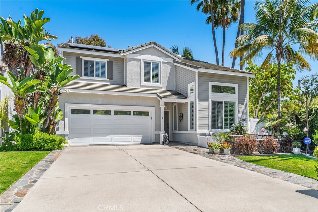 STUNNING POOL HOME with PANORAMIC VIEWS in Aliso Viejo's Desirable Key West Community! Welcome to this highly upgraded residence offering four spacious bedrooms and two and a half elegantly appointed bathrooms. The open concept design allows for abundant natural light throughout, creating a bright and airy atmosphere. The modern kitchen boasts high-end appliances, quartz counters and seamless indoor-outdoor flow, perfect for entertaining. The expansive primary suite provides a tranquil retreat, complete with generous closet space and a luxurious en-suite bath showcasing designer lighting and an oversized vanity. Additional bedrooms provide flexibility for various uses. Stepping outside, you'll be greeted by a lush tropical landscape and panoramic scenic views. The expansive outdoor living area includes a BBQ, sparkling saltwater pool, spa, and an outdoor firepit, creating a true oasis. The spacious patio and scenic water feature offer a serene retreat. Numerous upgrades enhance the property, including a newer whole-house filtration system, EV charger, full home security system, newer dual pane windows, a paid-off solar system, a pebble tec saltwater pool and spa, a built-in Bose surround sound system, exterior LED arch lighting, and a newer water heater, PEX re-piping, plantation shutters. Located near top rated schools, and minutes to parks, hiking trails and Aliso Viejo Town Center.
This home has it all- location, lifestyle and luxury! Don't miss your chance to make it yours! Welcome Home!