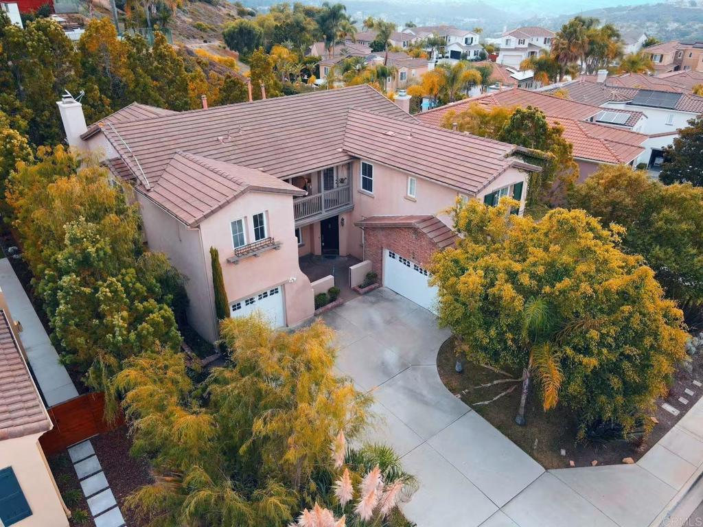 Best value per sq. ft. in all of Rancho Dorado—not to mention it also has ocean views! If your buyer is looking for a great deal, this is it! This Spanish-style residence offers over 3,500 sq. ft. of living space with soaring ceilings, abundant natural light, and a flexible floorplan. While the home needs some cosmetic updates, it immediately impresses with a palatial master suite featuring a fireplace, sitting area, balcony with sweeping ocean views, spa-like bath with dual vanities, and an enormous walk-in closet. The kitchen and family room open to a beautifully landscaped backyard with hardscape and plenty of room for a pool. The formal dining room with butler’s pantry access, separate office with built-ins and private bath, and a first-floor guest bedroom with its own full bath add function and flexibility. A 3-car garage completes the layout. Rancho Dorado is known for wide streets, sidewalks, parks, miles of walking and biking trails, and year-round ocean breezes. Minutes to beaches, shopping, restaurants, schools, golf, and the Coaster station. Bring your vision and create instant equity—this is the best value in the neighborhood!